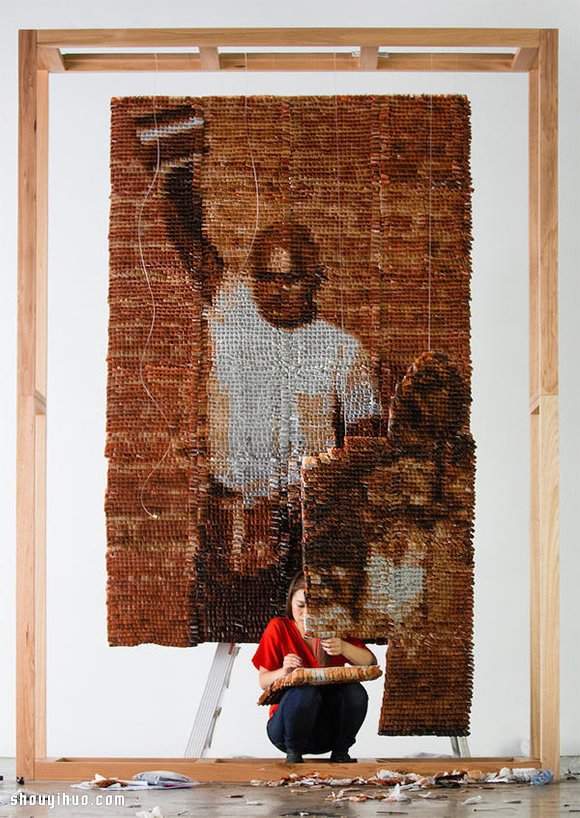 两万个茶包拼出一幅大型“拉茶男”人物像