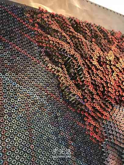 旋紧或松开,上万个螺丝钉制作的3D立体画像